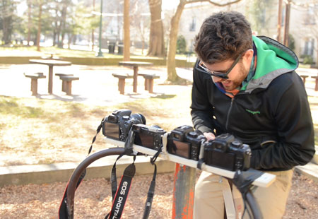 John with cameras on merry-go-round
